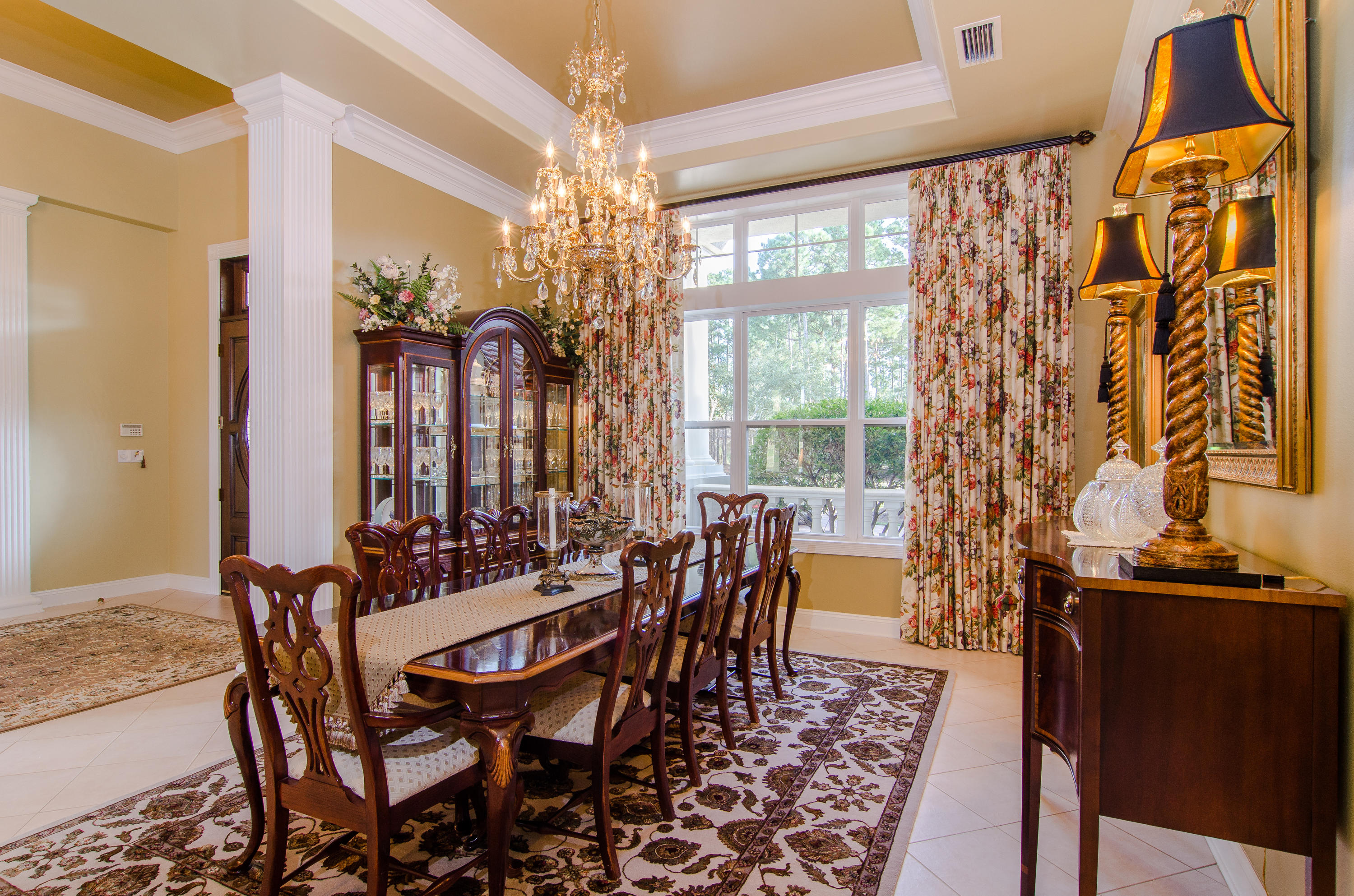 2954 Pine Valley Road Miramar Beach, FL 32550 - Photo 22 of 54 a view of a dining room with furniture and chandelier