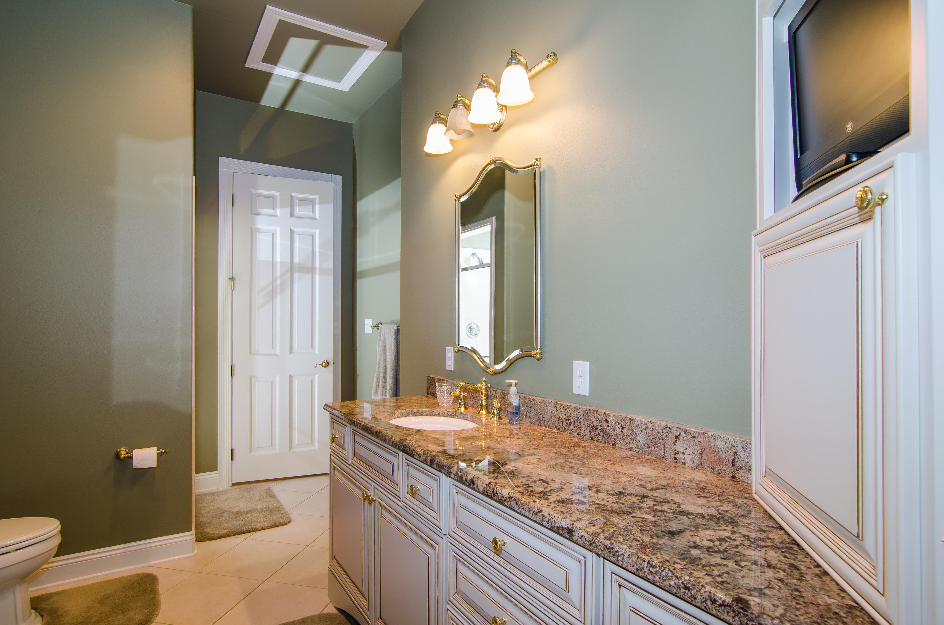 2954 Pine Valley Road Miramar Beach, FL 32550 - Photo 40 of 54 a bathroom with a granite countertop sink and a mirror