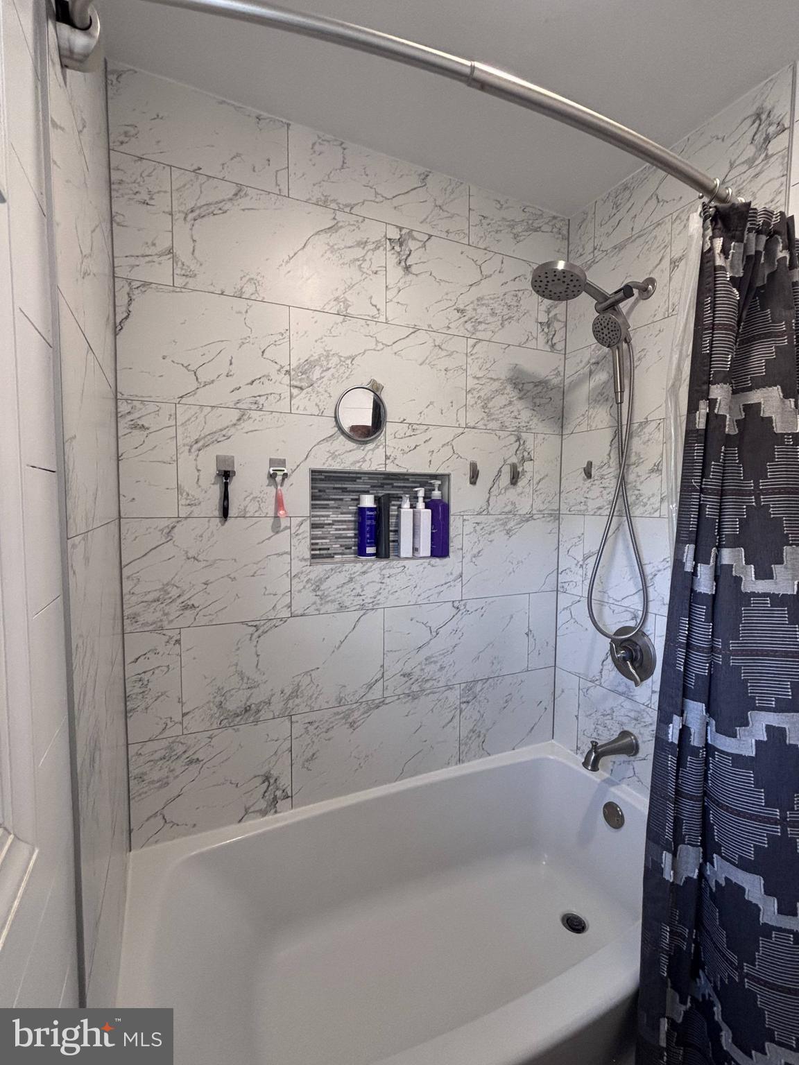 1119 East Meadow Road Manheim, PA 17545 - Photo 11 of 29 a bathroom with a bathtub