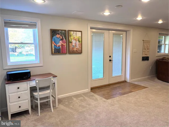 a view of a workspace with furniture