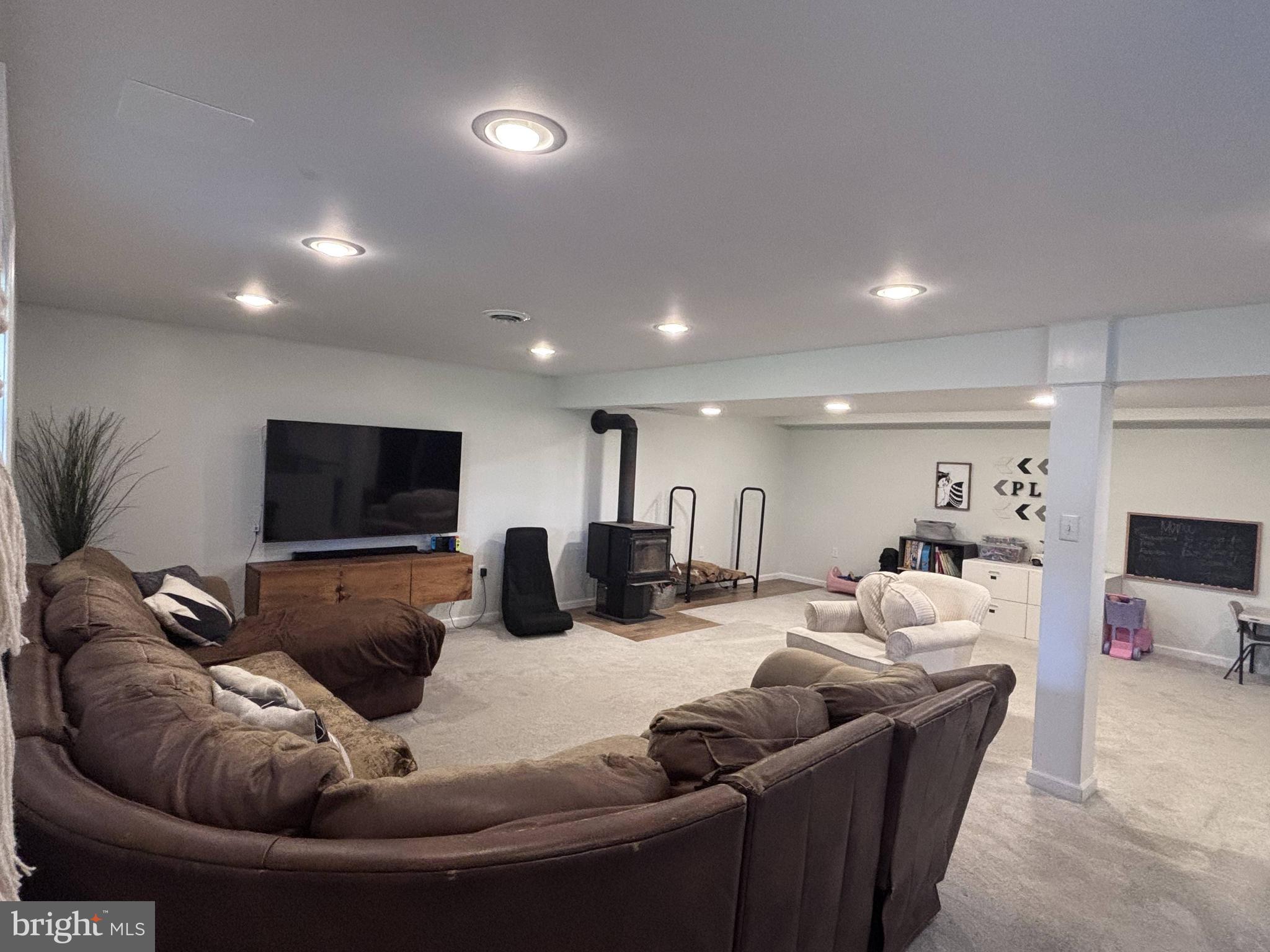 1119 East Meadow Road Manheim, PA 17545 - Photo 19 of 29 a living room with furniture and a flat screen tv