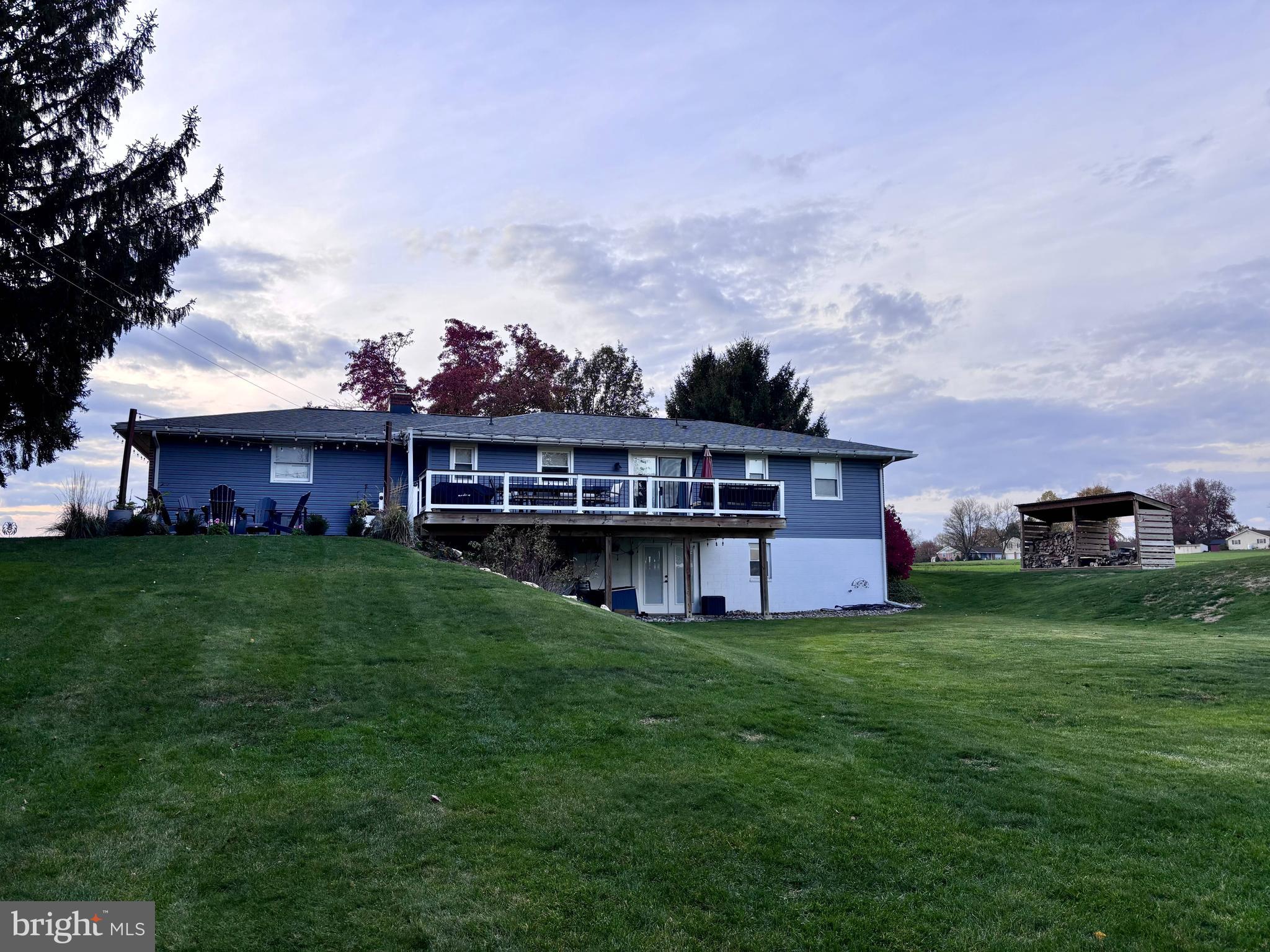 1119 East Meadow Road Manheim, PA 17545 - Photo 27 of 29 a view of a big house with a big yard and large trees