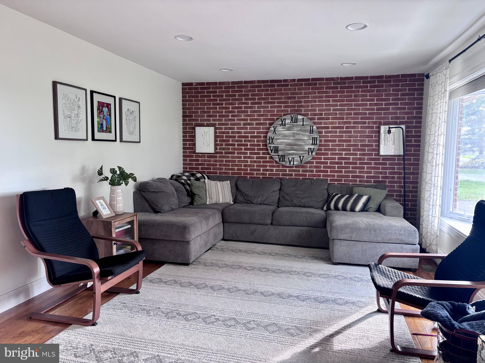 1119 East Meadow Road Manheim, PA 17545 - Photo 3 of 29 a living room with furniture and a window