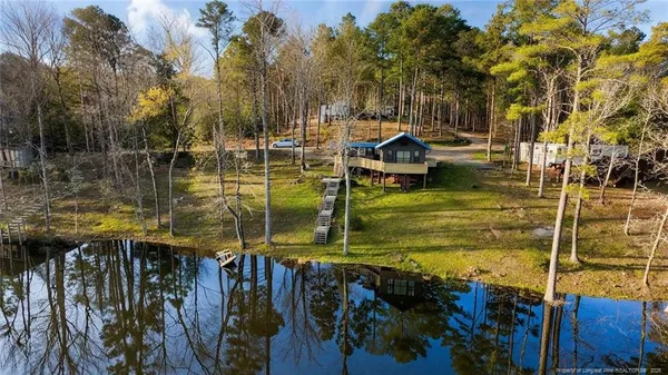 a view of swimming pool with a garden
