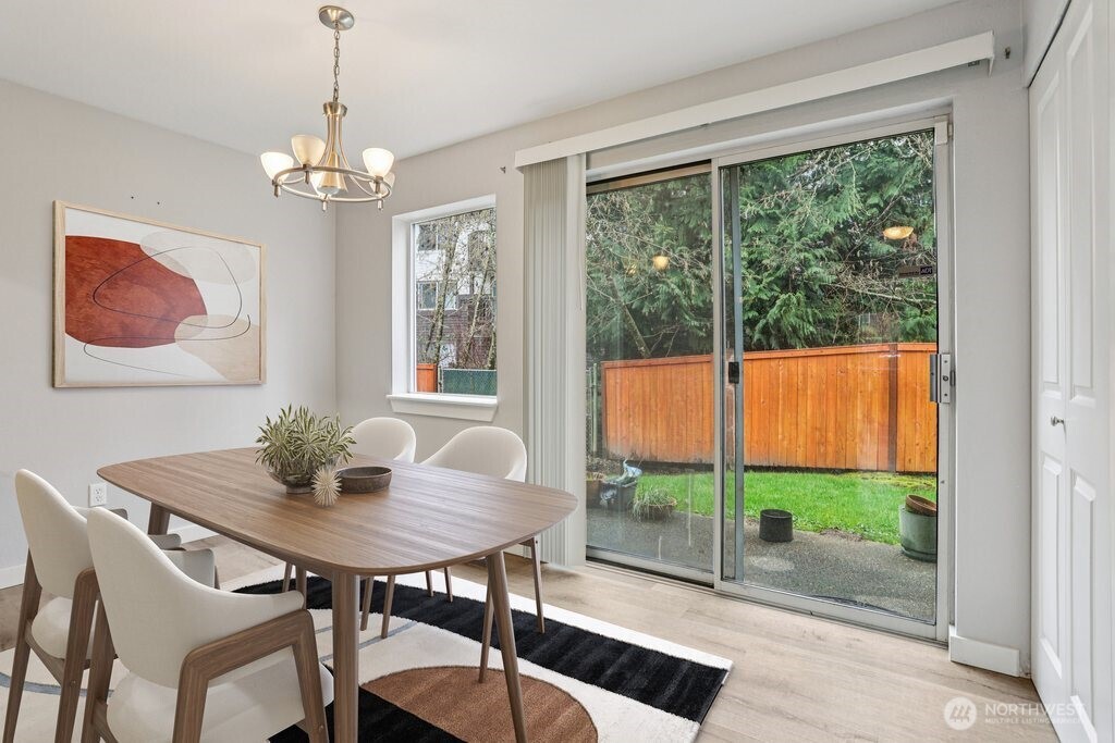 412 Center Road, Unit A1 Everett, WA 98204 - Photo 11 of 23 a view of a dining room with furniture window and outside view