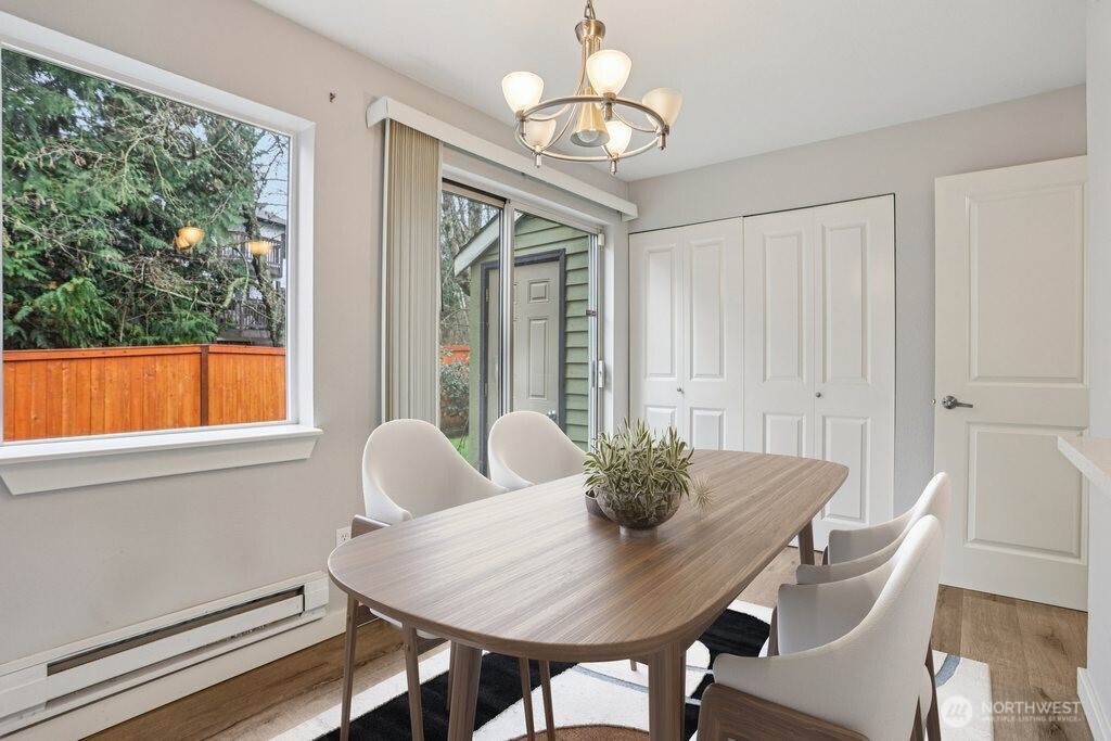 412 Center Road, Unit A1 Everett, WA 98204 - Photo 10 of 23 a view of a dining room with furniture window and outside view