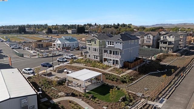a view of a swimming pool with an outdoor seating