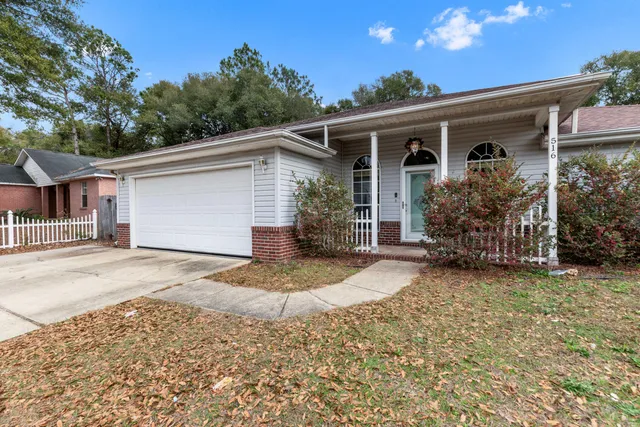 front view of a house with a patio