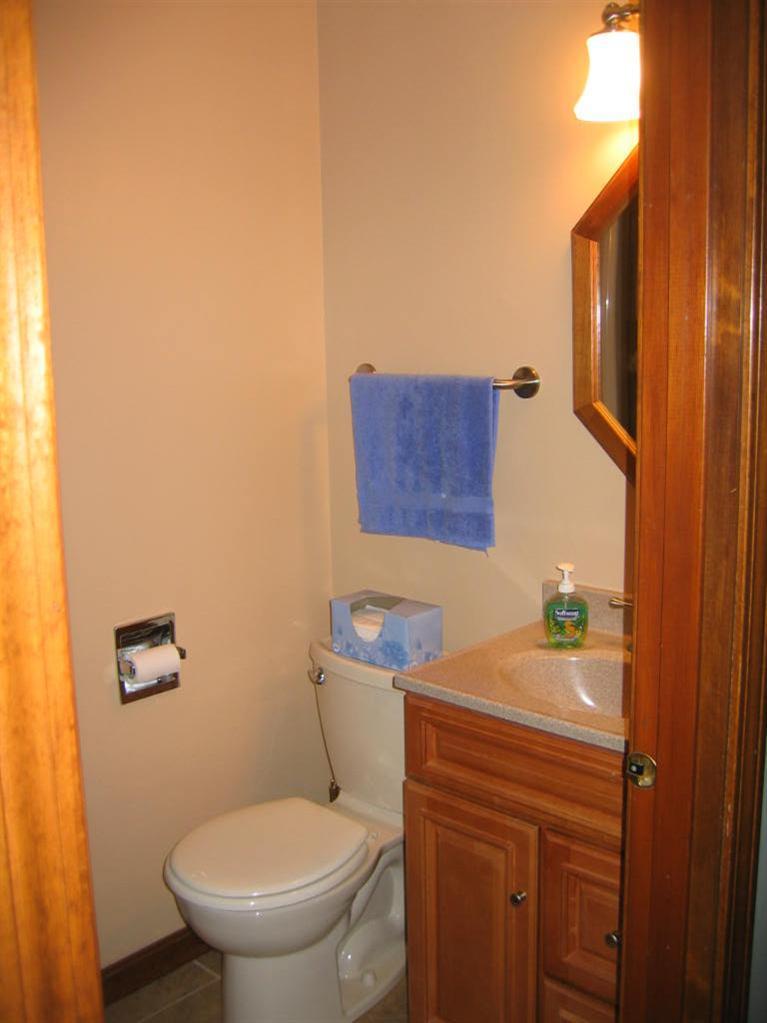 100 Ensign Road Centerville, MA 02632 - Photo 11 of 14 a bathroom with a sink a toilet and mirror