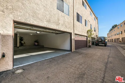 a view of a street with seating space