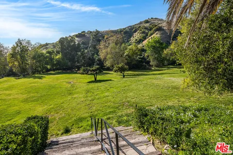 a view of an ocean from a yard