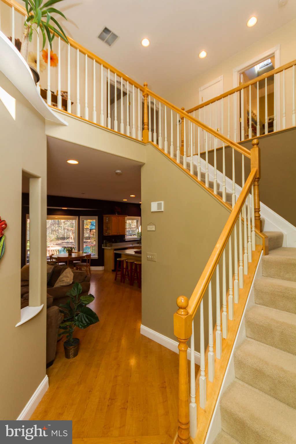 864 Shore Acres Road Arnold, MD 21012 - Photo 13 of 30 Center Stairwell Leading Upstairs