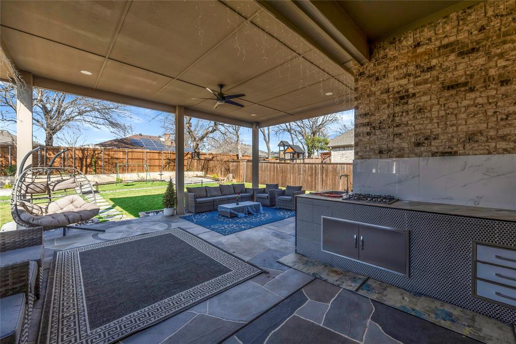 2218 Christopher Lane Euless, TX 76040 - Photo 24 of 28 a view of a backyard with sitting area