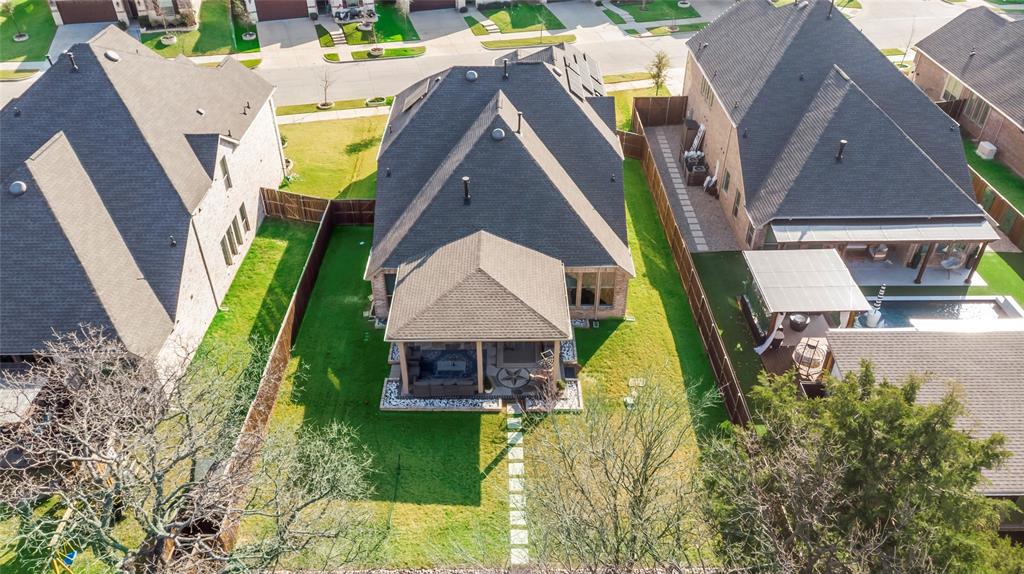 2218 Christopher Lane Euless, TX 76040 - Photo 28 of 28 an aerial view of a house with swimming pool and large trees