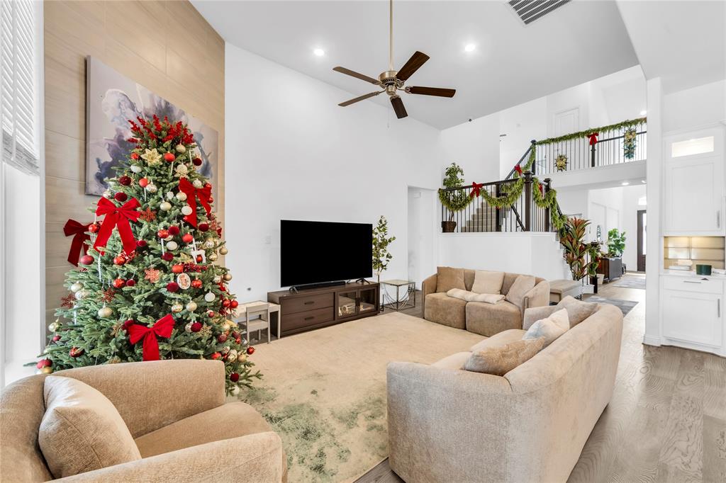2218 Christopher Lane Euless, TX 76040 - Photo 6 of 28 a living room with furniture and a flat screen tv