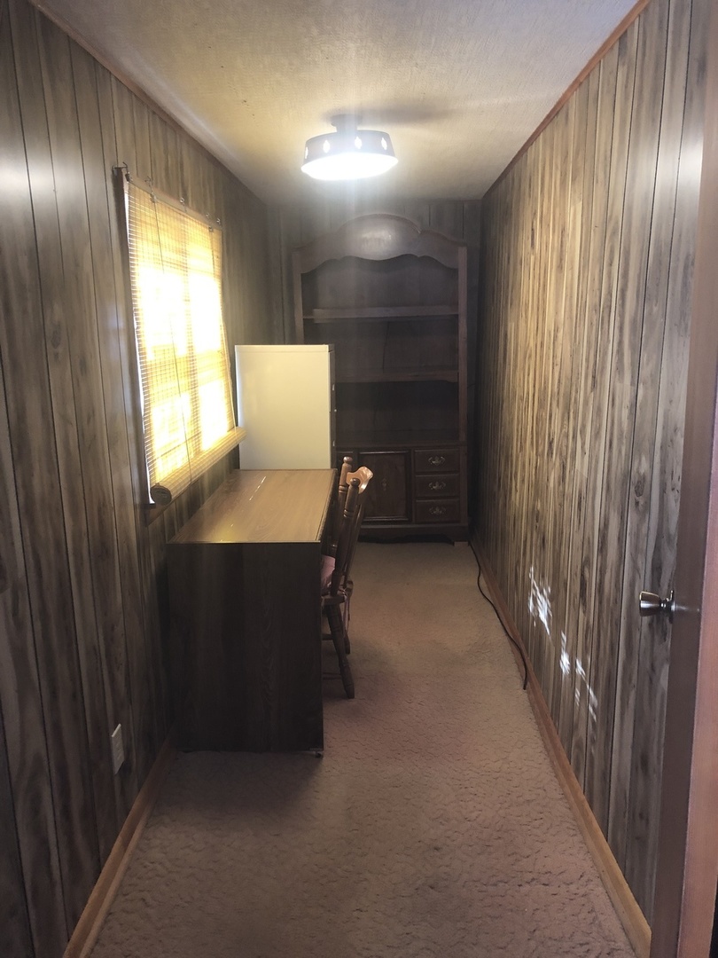 7968 South Sugar Island Road Chebanse, IL 60922 - Photo 26 of 39 a view of workspace with window and stairs