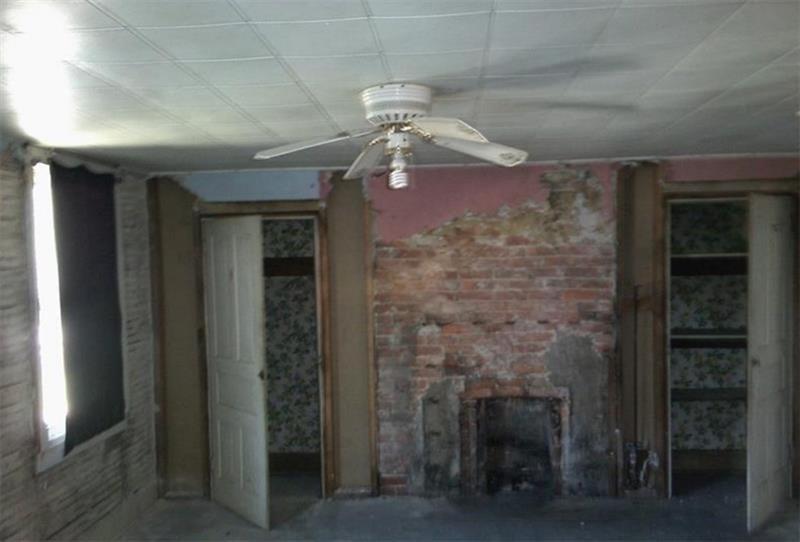 1746 Grange Road Charleroi, PA 15022 - Photo 3 of 11 a view of a livingroom with a fireplace