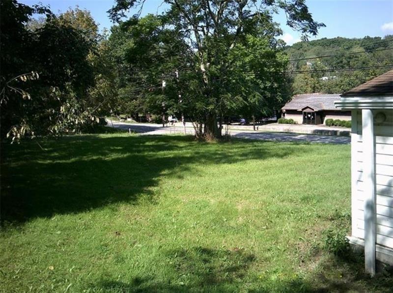 1746 Grange Road Charleroi, PA 15022 - Photo 6 of 11 a view of a house with a yard