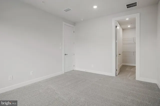 a bathroom with a shower and a bath tub