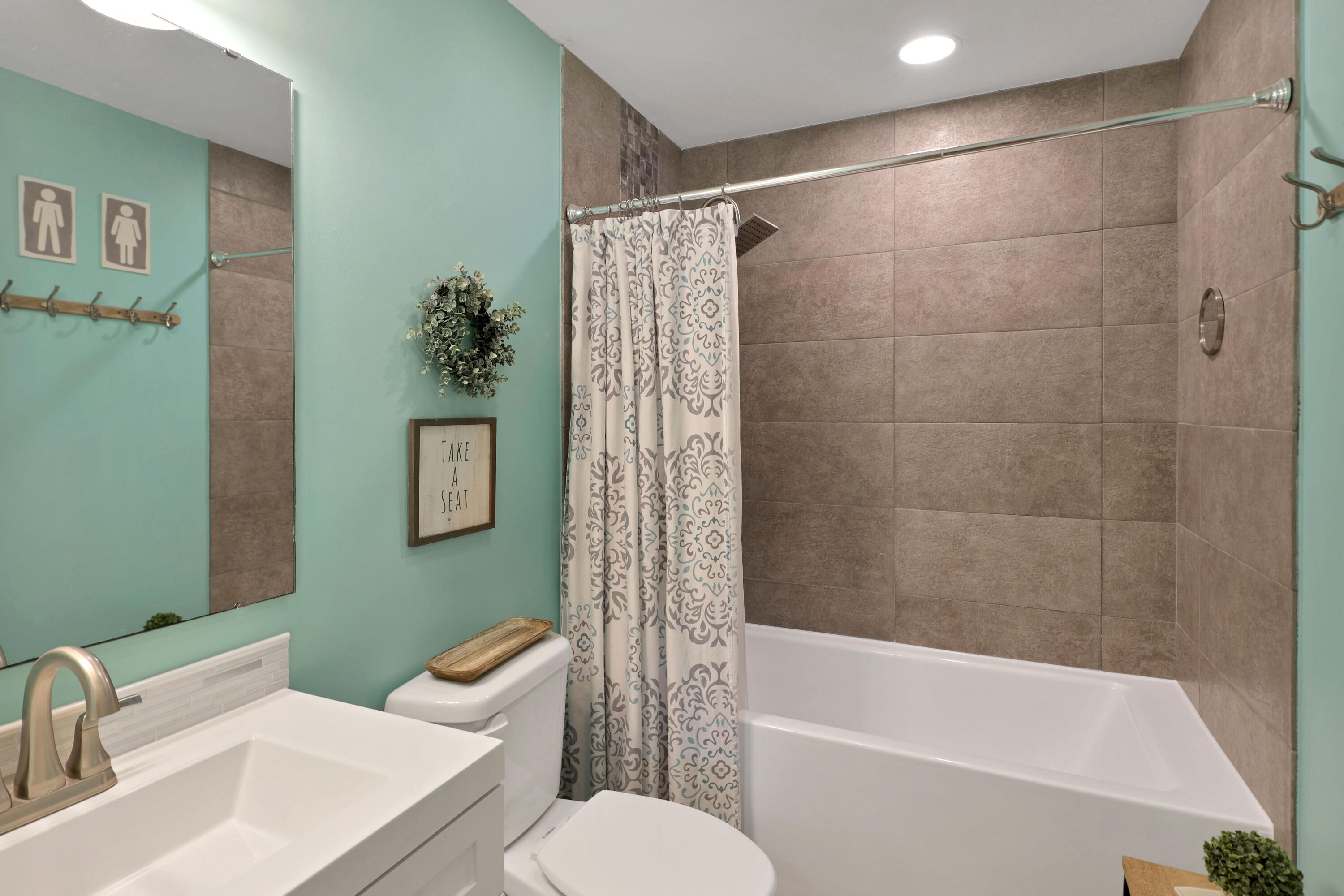 27087 Angel Fish Road Summerland Key, FL 33042 - Photo 15 of 32 a bathroom with a sink toilet and shower