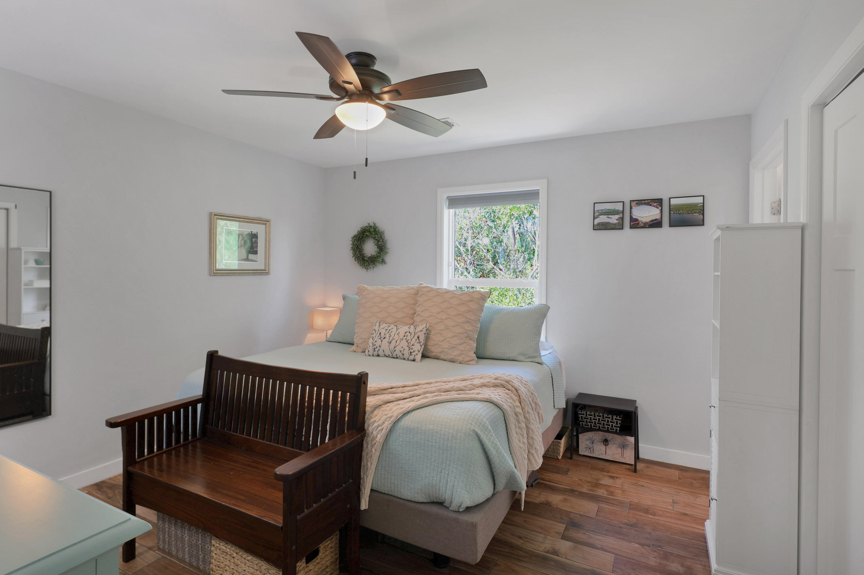 27087 Angel Fish Road Summerland Key, FL 33042 - Photo 19 of 32 a bedroom with a bed and a window