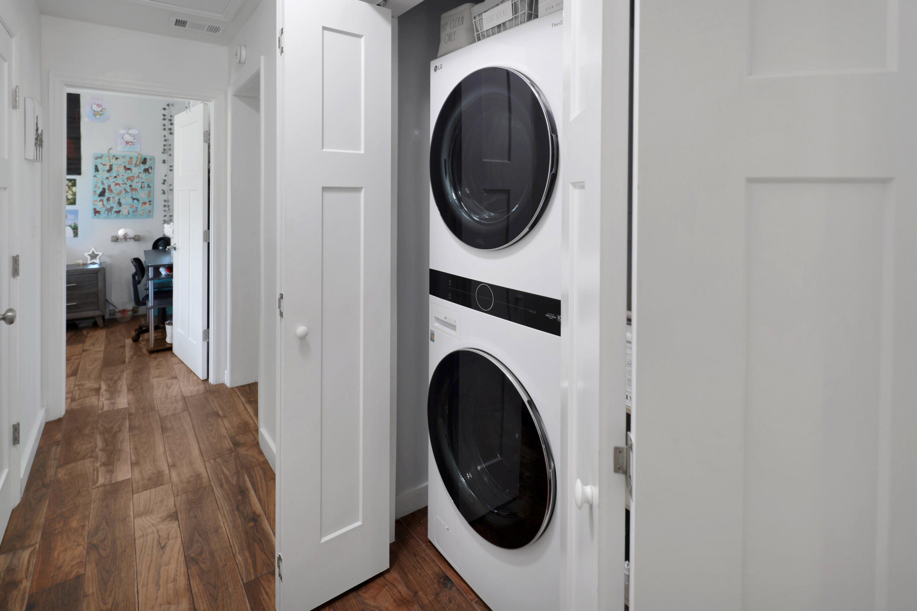 27087 Angel Fish Road Summerland Key, FL 33042 - Photo 23 of 32 a view of a hallway with washer and dryer