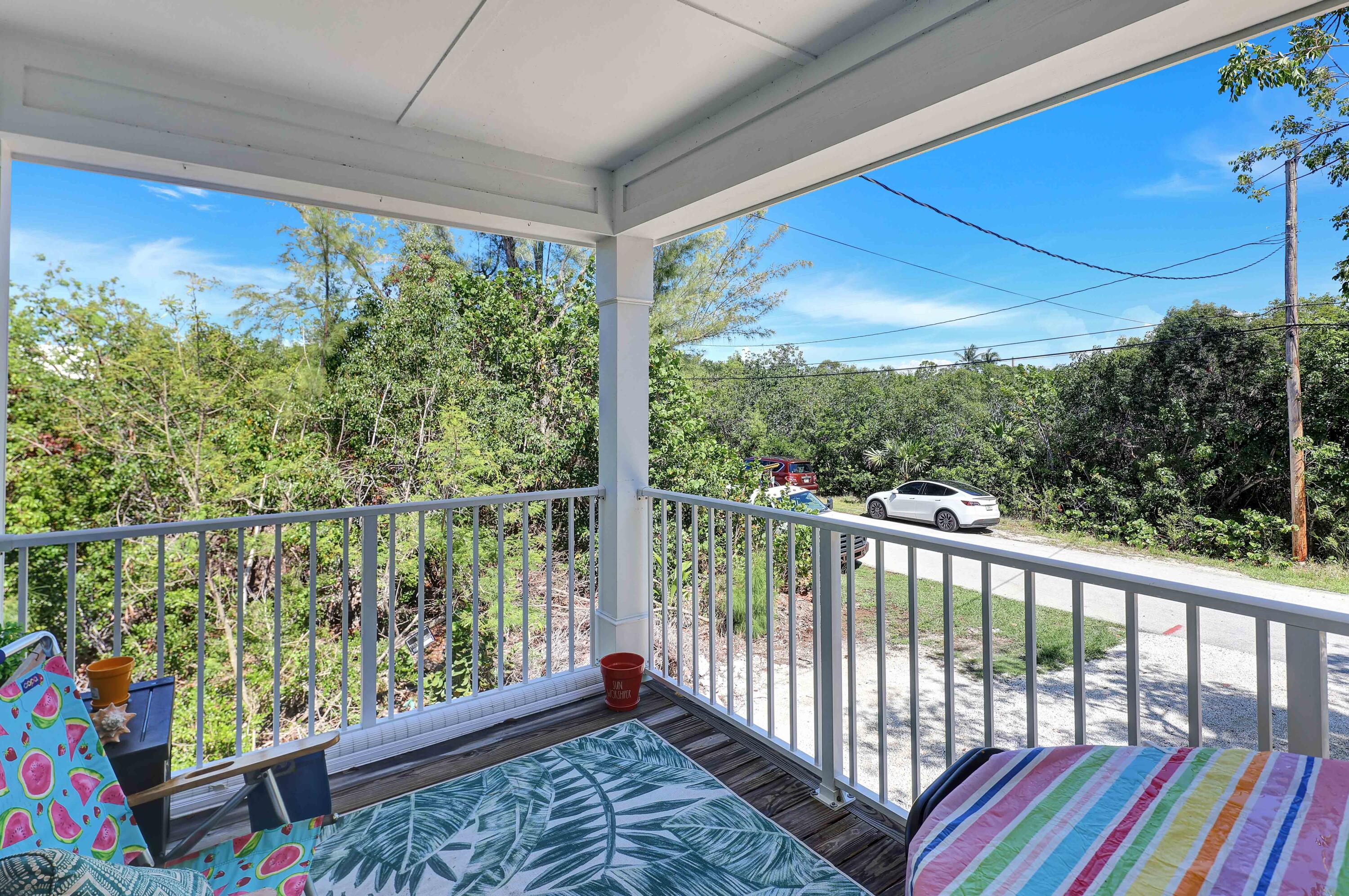 27087 Angel Fish Road Summerland Key, FL 33042 - Photo 24 of 32 a view of a city from a balcony