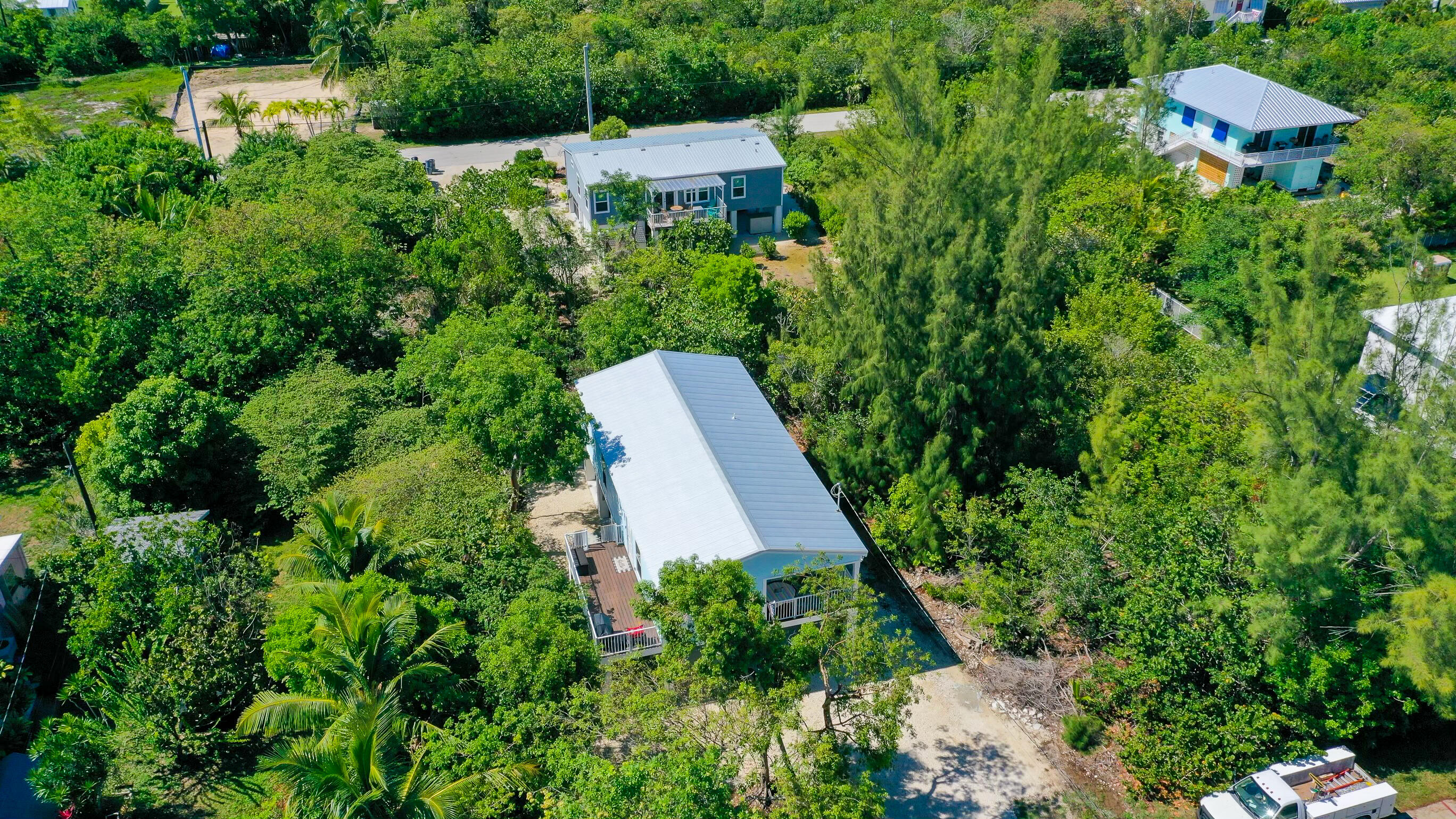 27087 Angel Fish Road Summerland Key, FL 33042 - Photo 30 of 32 an aerial view of residential house with outdoor space and trees all around