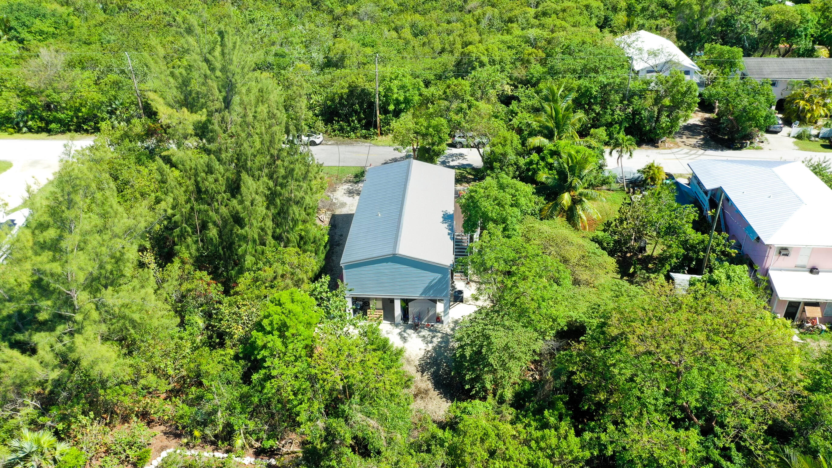 27087 Angel Fish Road Summerland Key, FL 33042 - Photo 32 of 32 an aerial view of a house with a yard and lake view