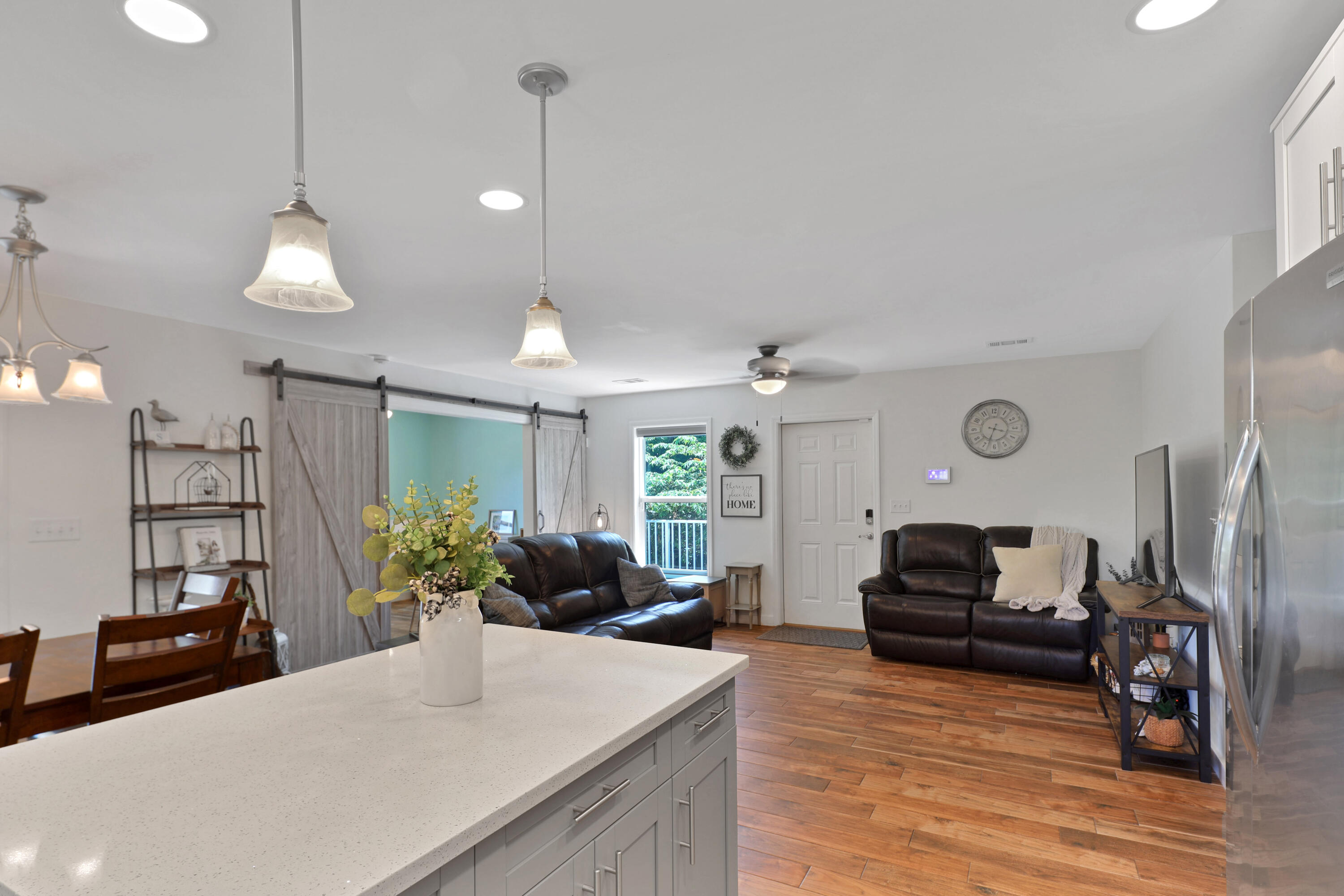 27087 Angel Fish Road Summerland Key, FL 33042 - Photo 9 of 32 a view of a living room and kitchen