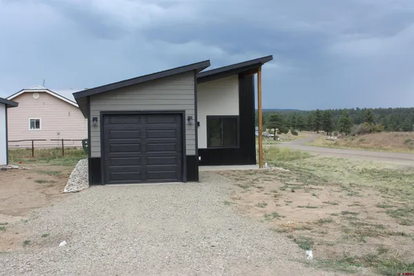 a view of backyard of house