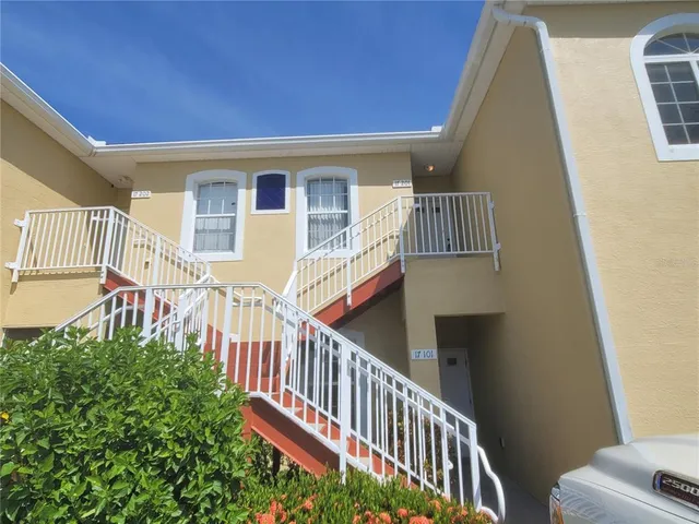 a view of balcony with furniture
