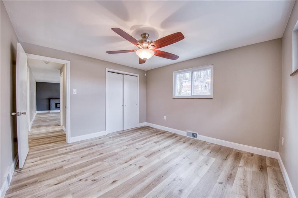 2158 Reis Run Road Pittsburgh, PA 15237 - Photo 13 of 50 wooden floor in an empty room with a window