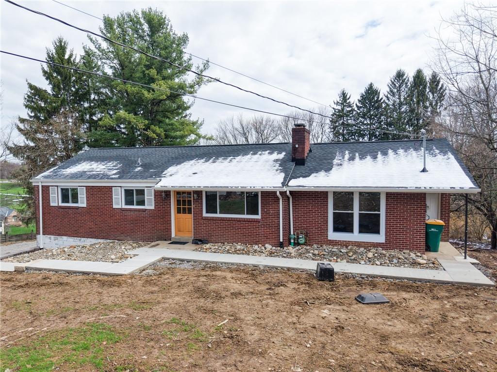 2158 Reis Run Road Pittsburgh, PA 15237 - Photo 2 of 50 a front view of a house with a yard