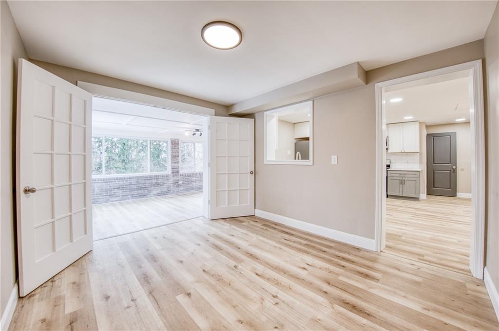 2158 Reis Run Road Pittsburgh, PA 15237 - Photo 25 of 50 an empty room with wooden floor and windows