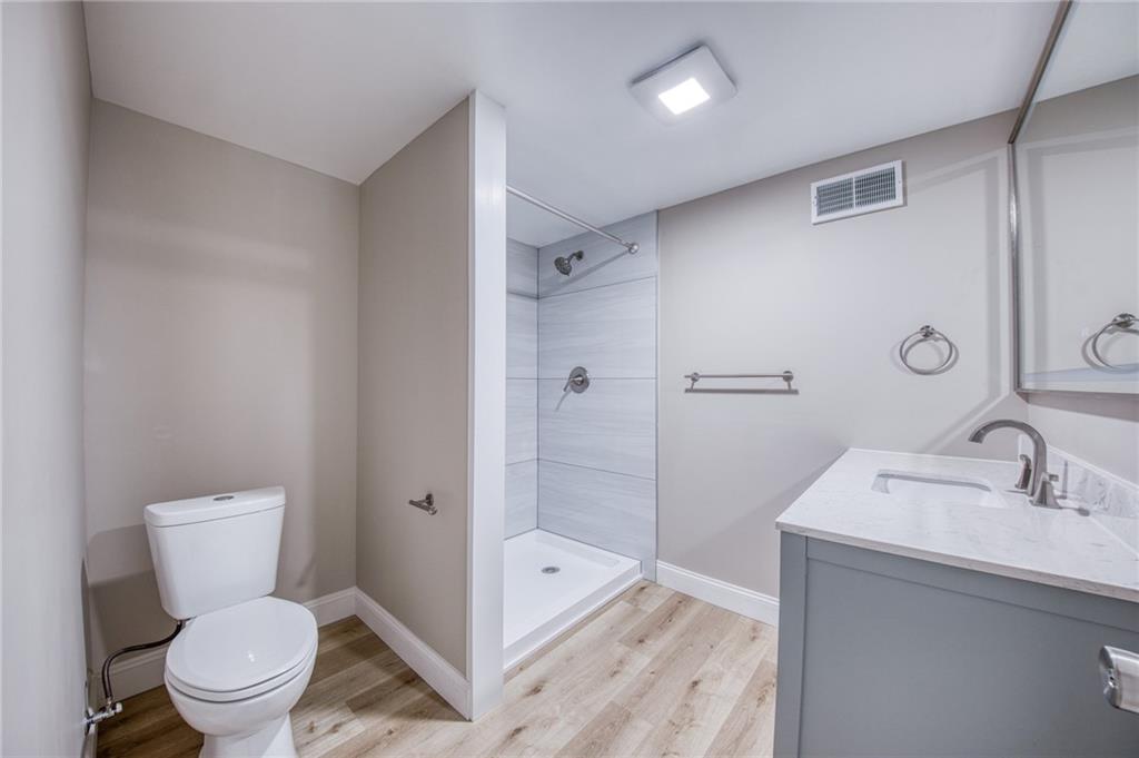 2158 Reis Run Road Pittsburgh, PA 15237 - Photo 46 of 50 a bathroom with a toilet sink and shower