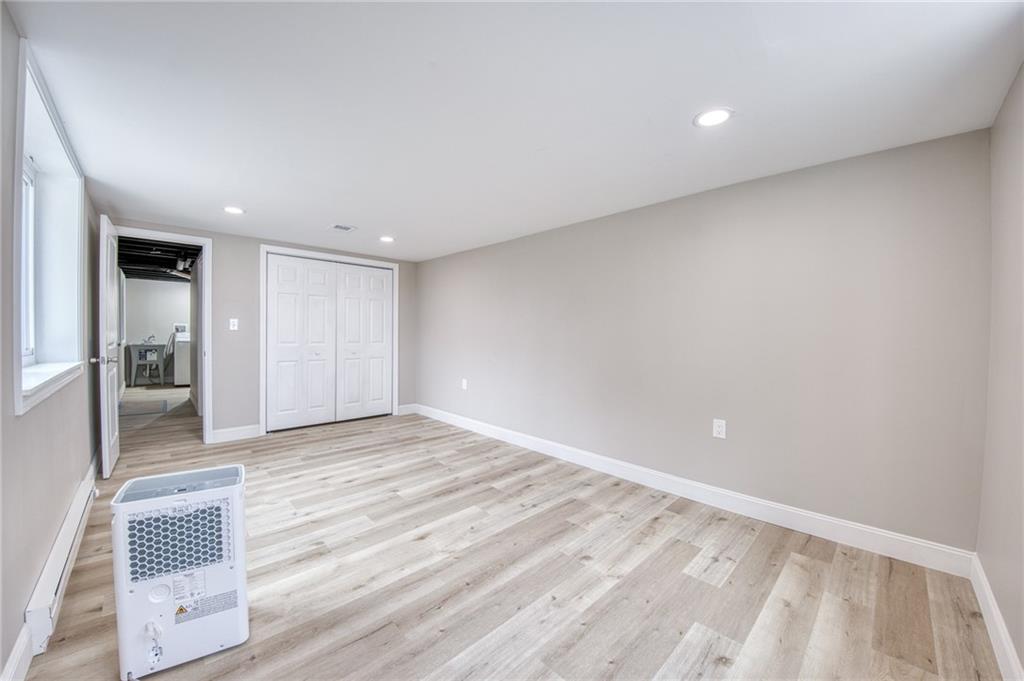 2158 Reis Run Road Pittsburgh, PA 15237 - Photo 49 of 50 a view of an empty room and wooden floor