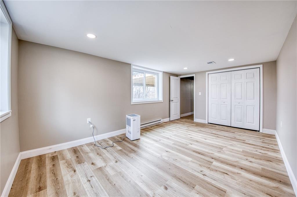 2158 Reis Run Road Pittsburgh, PA 15237 - Photo 50 of 50 a view of empty room with wooden floor and fan
