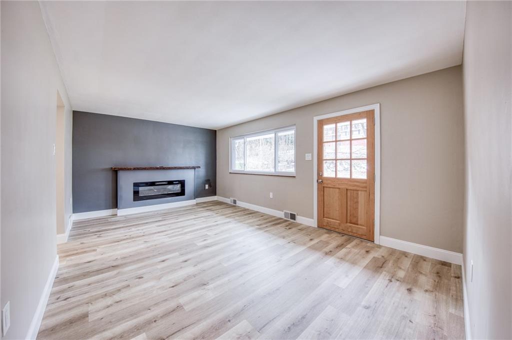 2158 Reis Run Road Pittsburgh, PA 15237 - Photo 9 of 50 an empty room with windows and closet