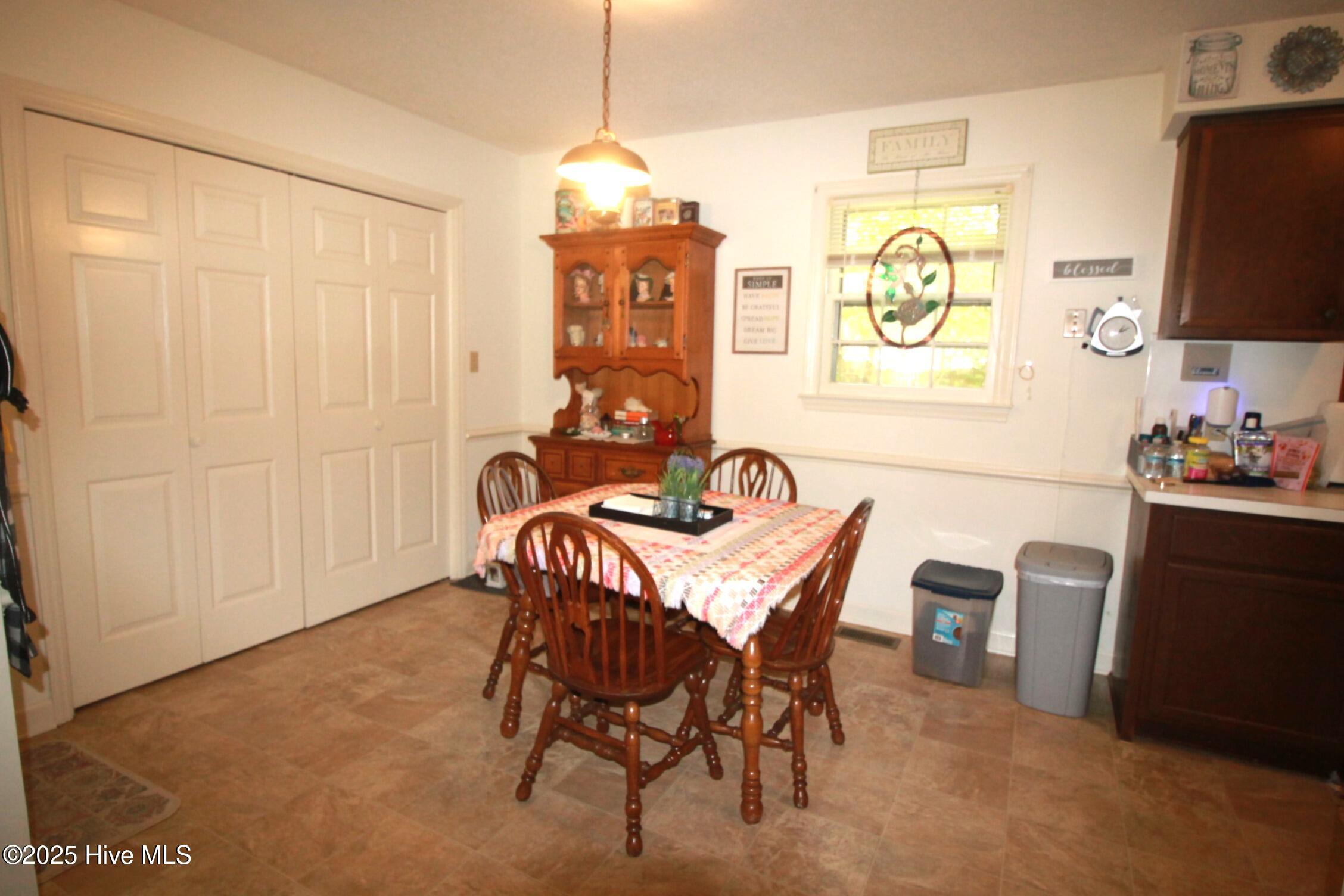 6137 River Road Washington, NC 27889 - Photo 11 of 21 dining with W/D closet