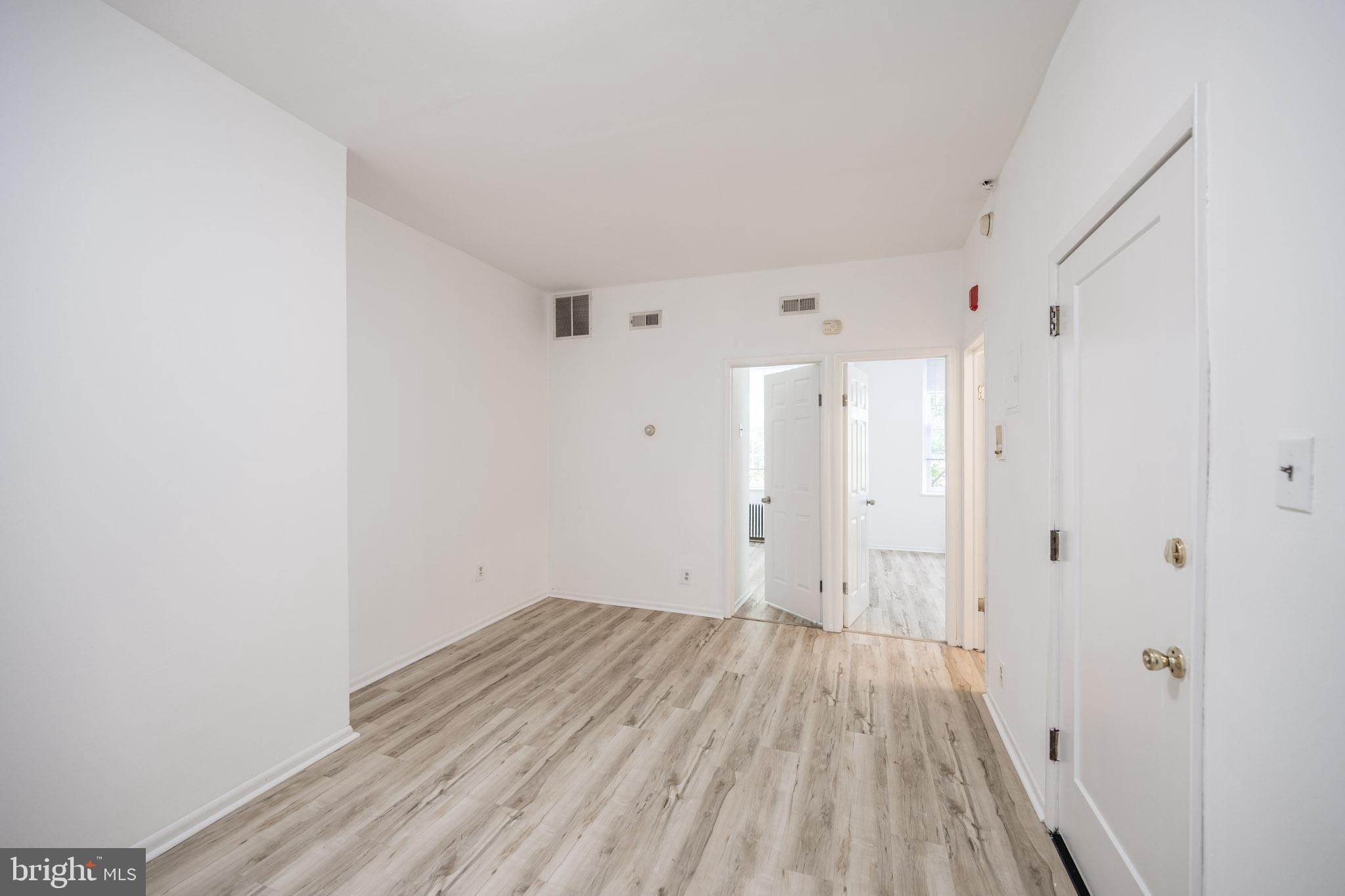 625 South 10th Street, Unit 2F Philadelphia, PA 19147 - Photo 3 of 13 a view of a room with wooden floor