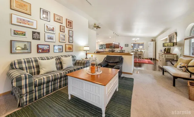 a living room with furniture and a table