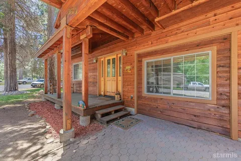 a view of a backyard of a house