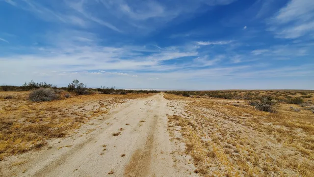 a view of ocean with a beach