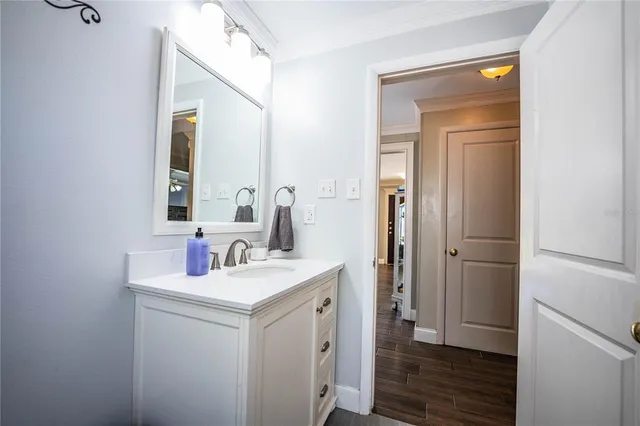 a bedroom with furniture window and a ceiling fan