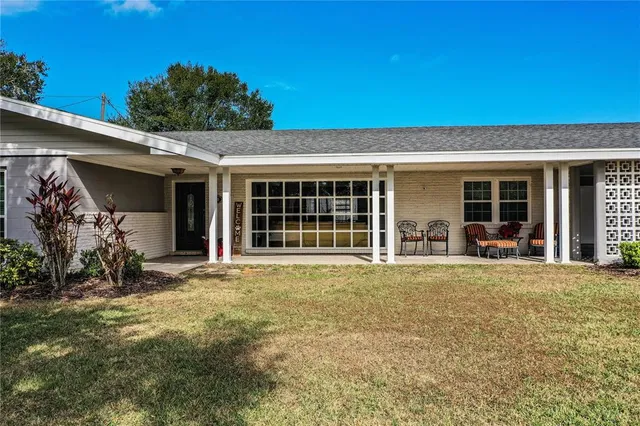 a front view of a house with a porch