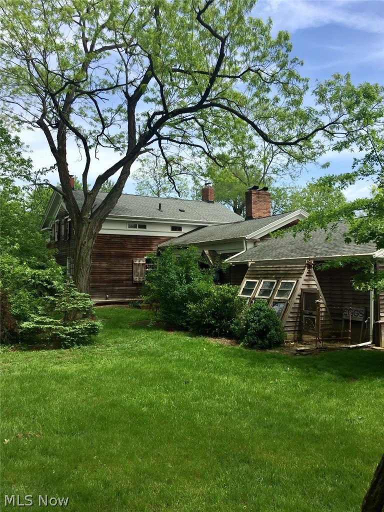2386 Ridgewood Road Medina, OH 44256 - Photo 34 of 35 Here's a westerly view of the home. In the rear corner of the home is where the well is located. It is approximately 150' deep and provides an ample water supply to the home. In Feb. 2019, a 10 GPM Franklin water well pump was installed. A Kinetico K5 Drinking-Water Station is located in the basement and further filters water coming into the home. The home is heated w/hot water heat. The boiler is checked annually and was last checked on 2/6/19. A 58 gal. electric hot H20 tank was replaced in 2004.