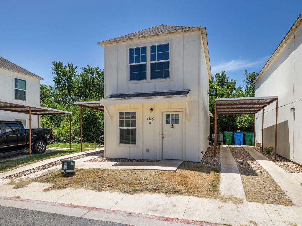 a house view with a outdoor space