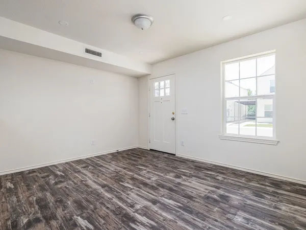 an empty room with windows