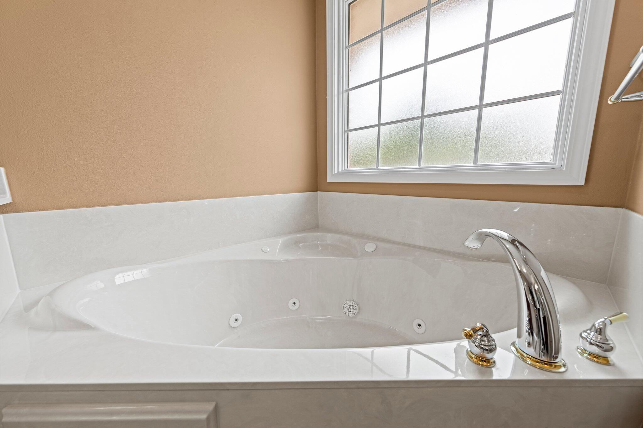 20 Maple Avenue Shalimar, FL 32579 - Photo 19 of 55 a bathroom with a bathtub